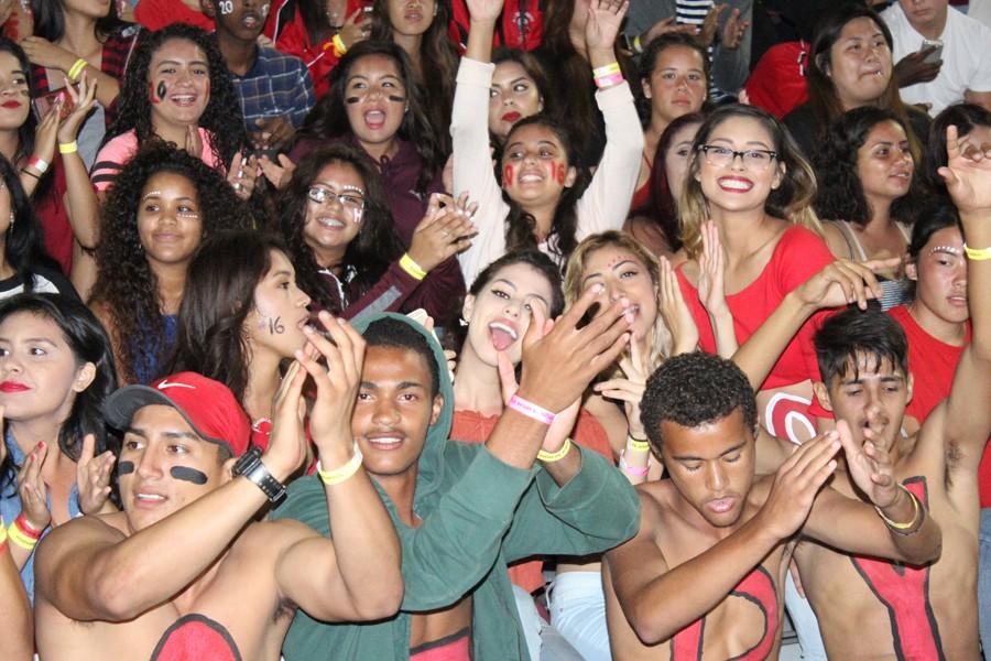 Seniors show of their school pride during a football game. 