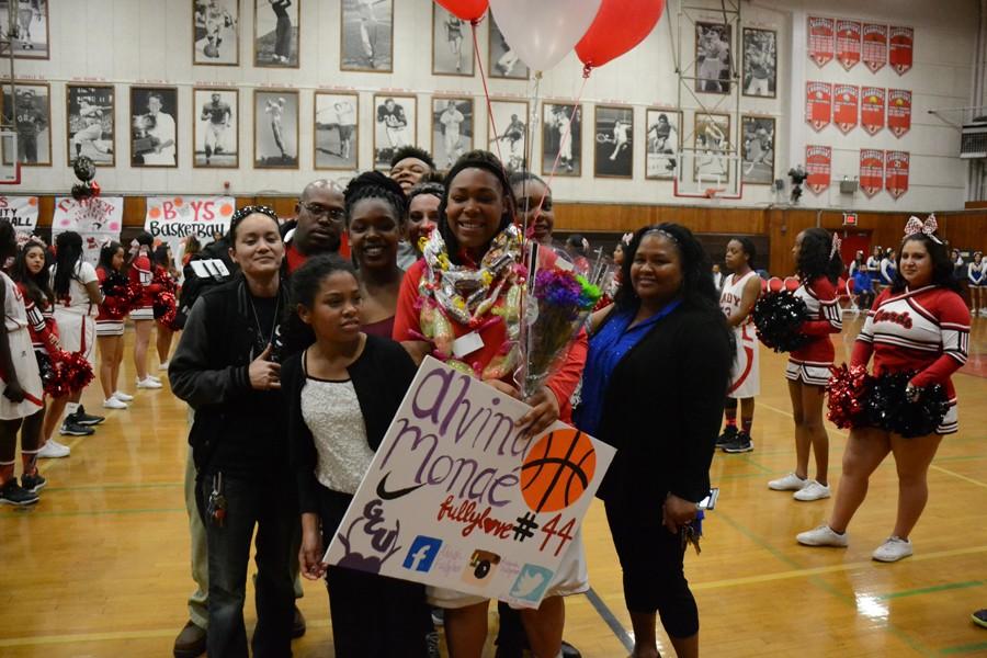 Senior Alviah Fullylove takes a pictures with those she loves.