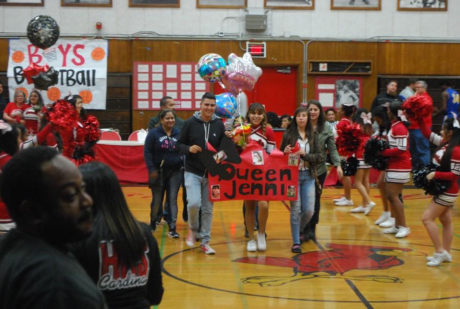 Senior Jennifer Ponciano walks with her close friends and family in Senior Night.