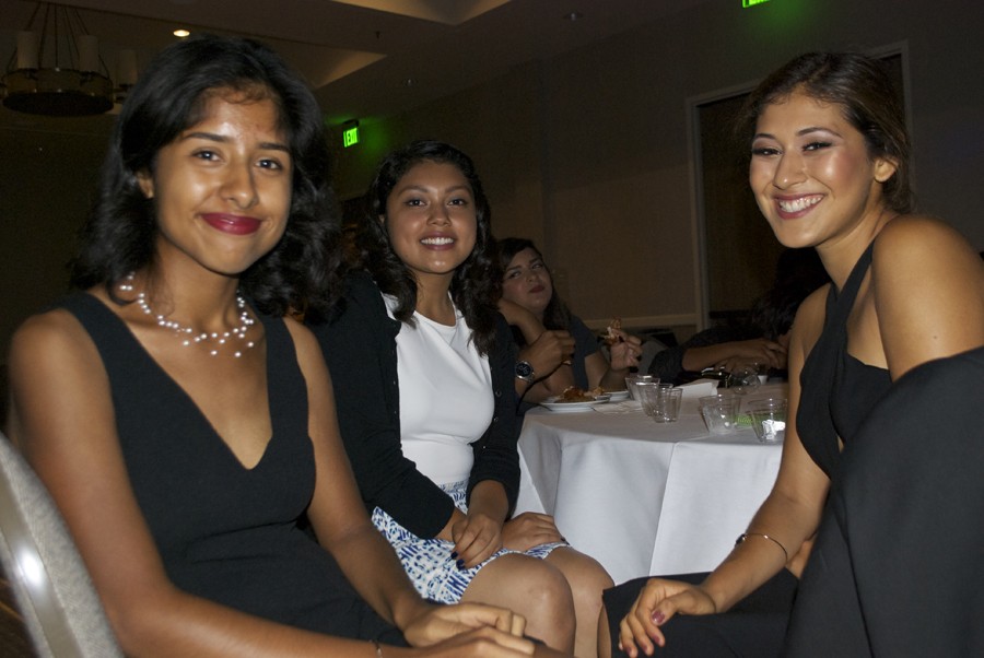 Juniors Leslie Torres, Verenise Martinez, and Samantha Gaeta all sits together at the homecoming dance.