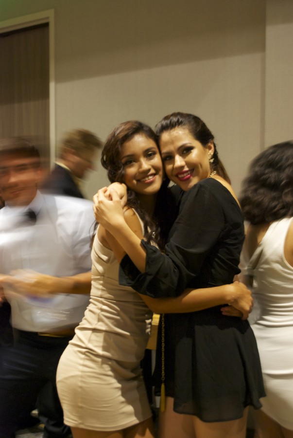 Seniors Francisca Orentes and Victoria Heredia hugs each other for a picture.