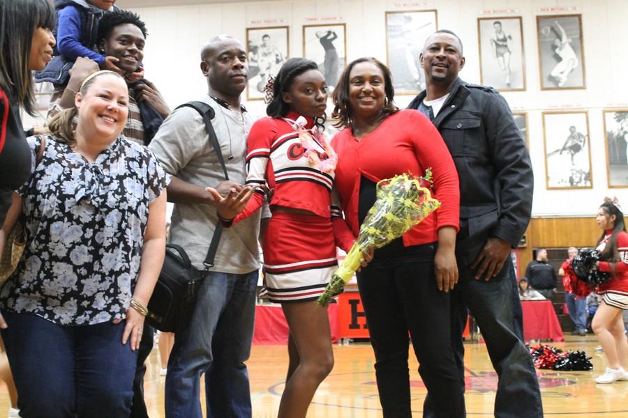 Senior Jadasha Drake takes a picture with her family. 